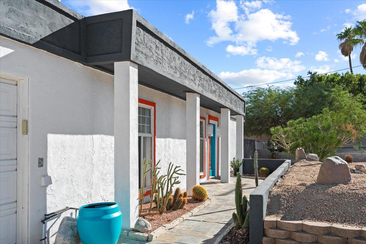 2236 North Victoria Road Palm Springs, CA 92262 - Photo 2 of 40 a front view of a house with garden