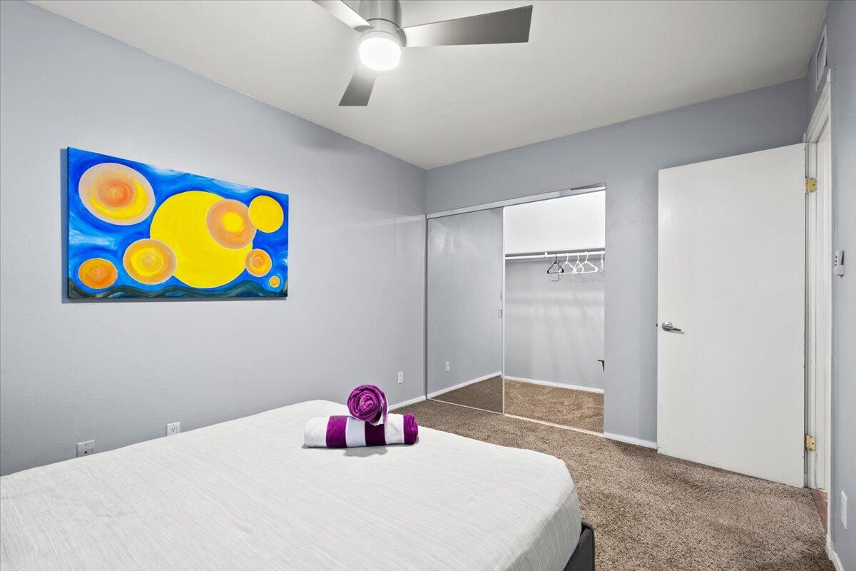 2236 North Victoria Road Palm Springs, CA 92262 - Photo 25 of 40 a bedroom with a bed and a painting on the wall