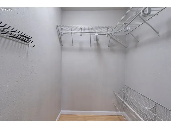 a view of a room with racks on the wall