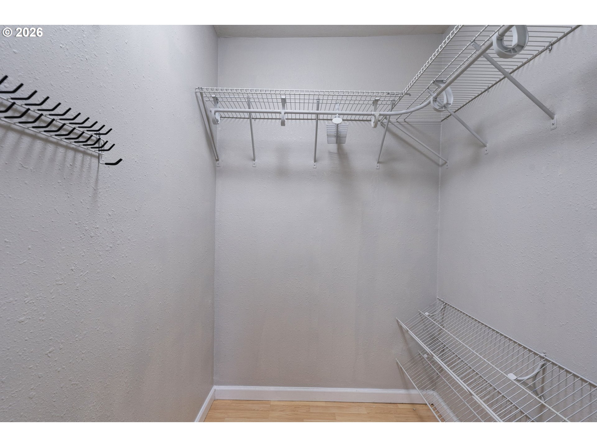 25106 Northeast 25th Street Camas, WA 98607 - Photo 18 of 47 a view of a room with racks on the wall