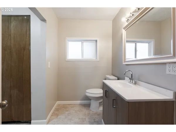a bathroom with a sink and a toilet