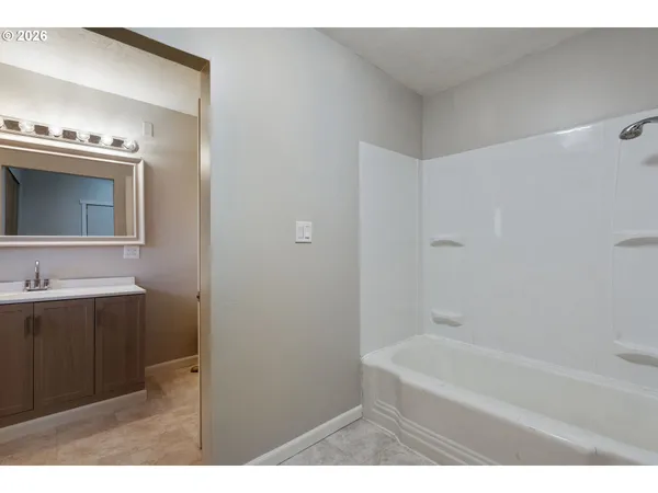 a bathroom with a sink and a bathtub