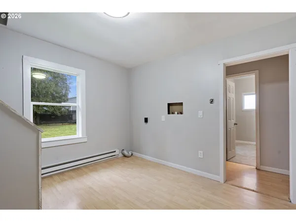 a view of an empty room and window