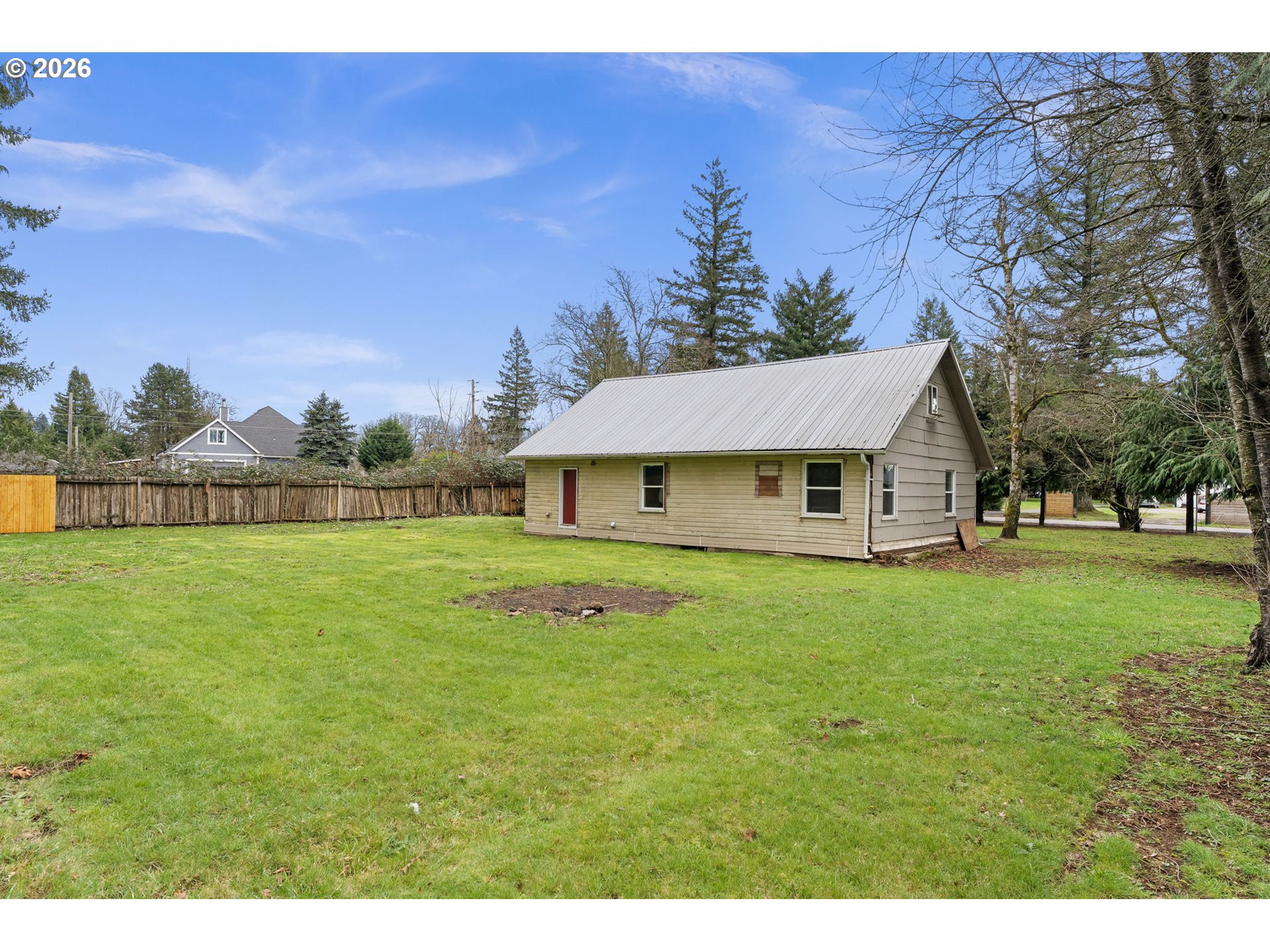 25106 Northeast 25th Street Camas, WA 98607 - Photo 34 of 47 a view of a house with a big yard and large trees