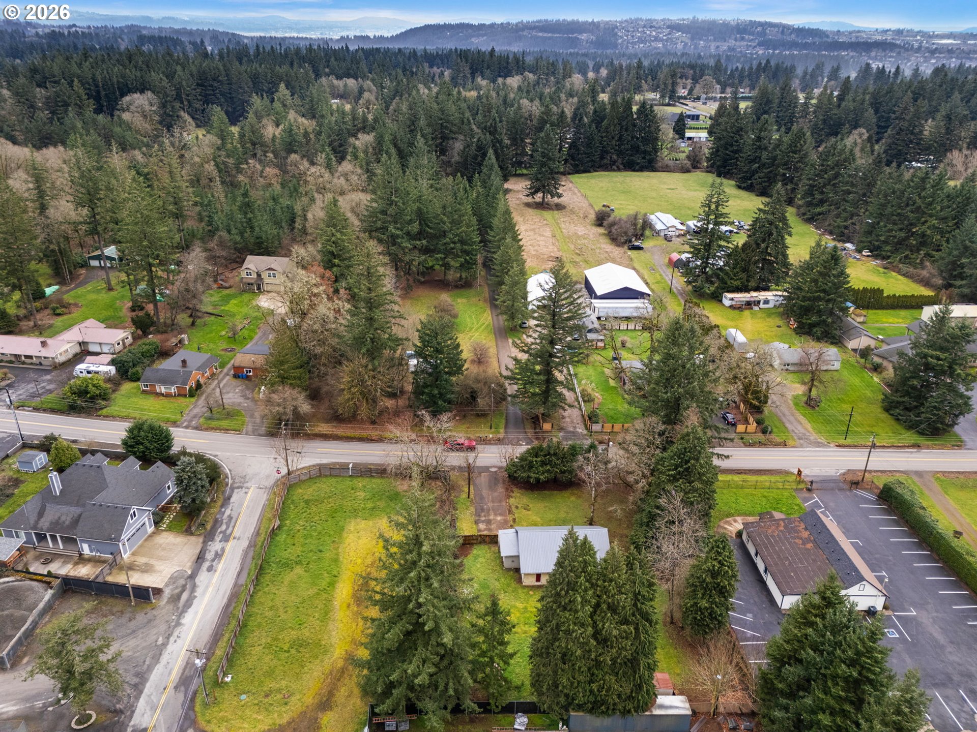 25106 Northeast 25th Street Camas, WA 98607 - Photo 38 of 47 an aerial view of a house with a garden and swimming pool