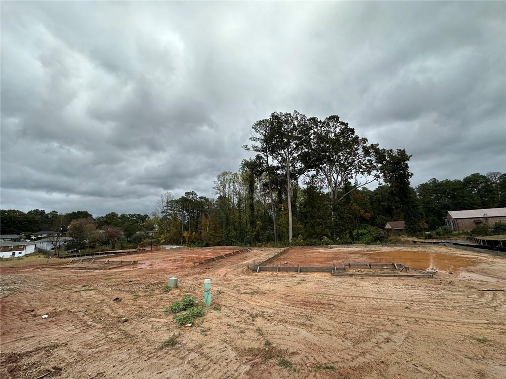 2080 Tilson Road Decatur, GA 30032 - Photo 4 of 13 a view of swimming pool with a yard in the background