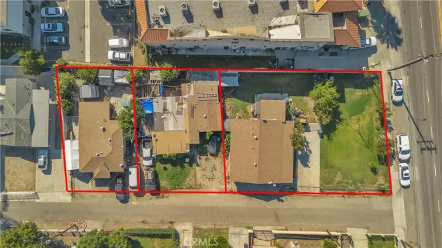 an aerial view of street and entrance