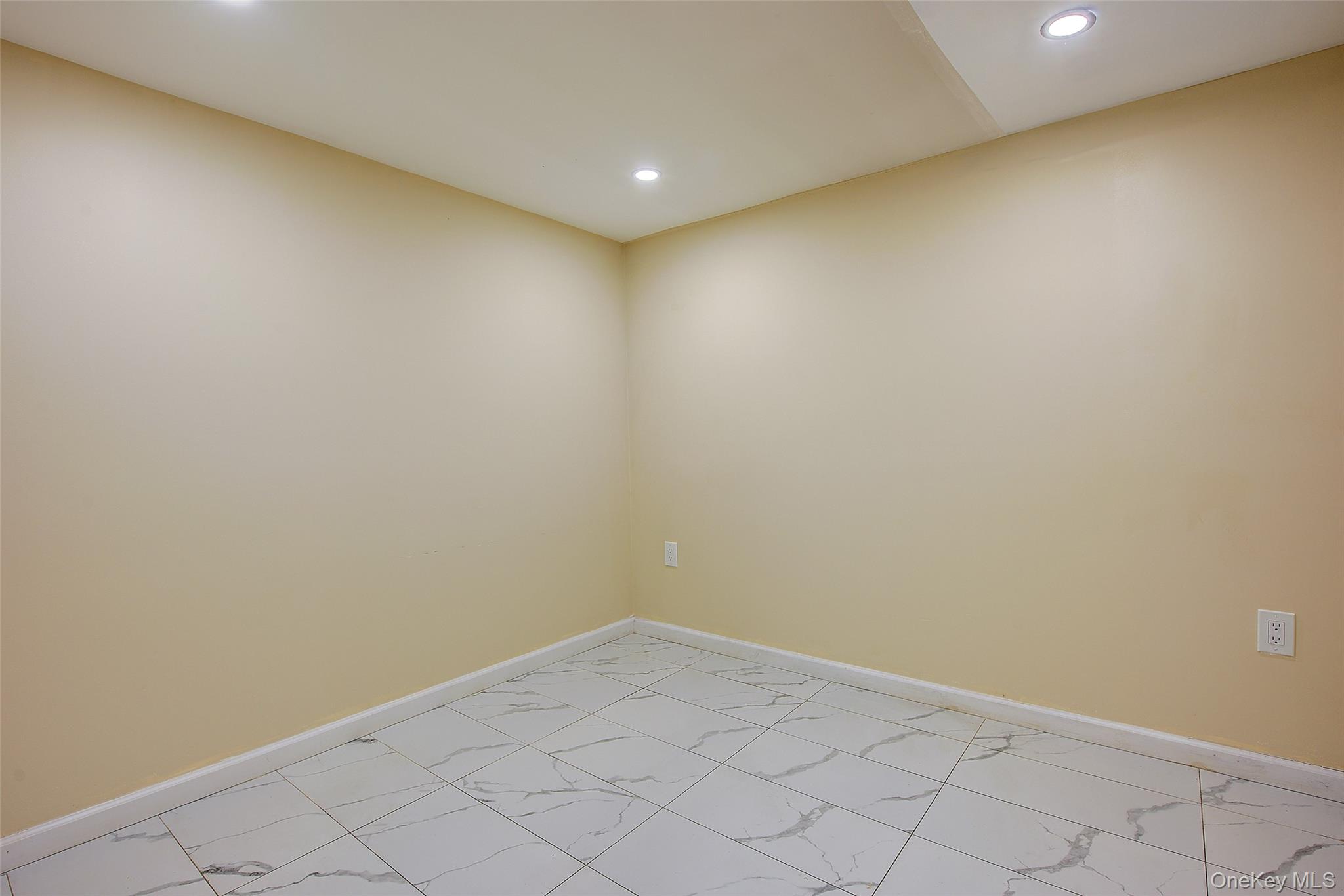 164-38 76th Road Queens, NY 11366 - Photo 38 of 44 a view of empty room