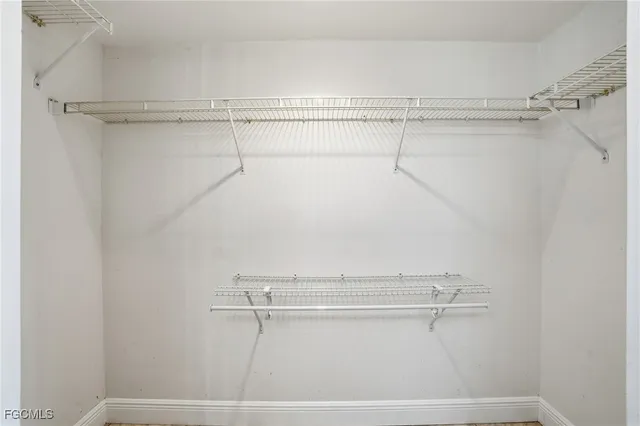 a view of a room with racks on the wall