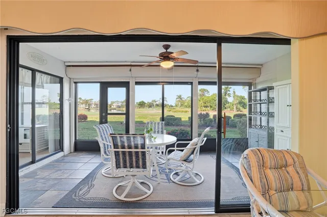 a view of a patio with furniture
