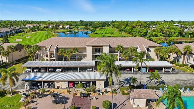 an aerial view of a house with garden space and outdoor seating