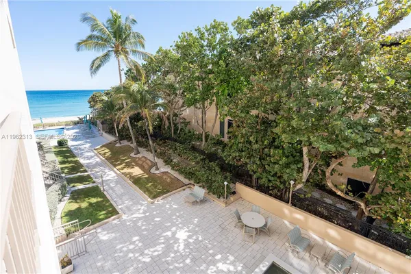 a view of a backyard of the house