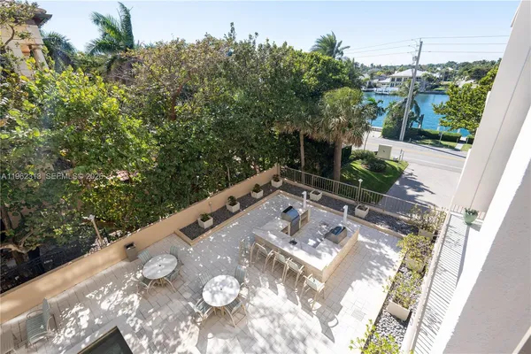 a view of a backyard with furniture