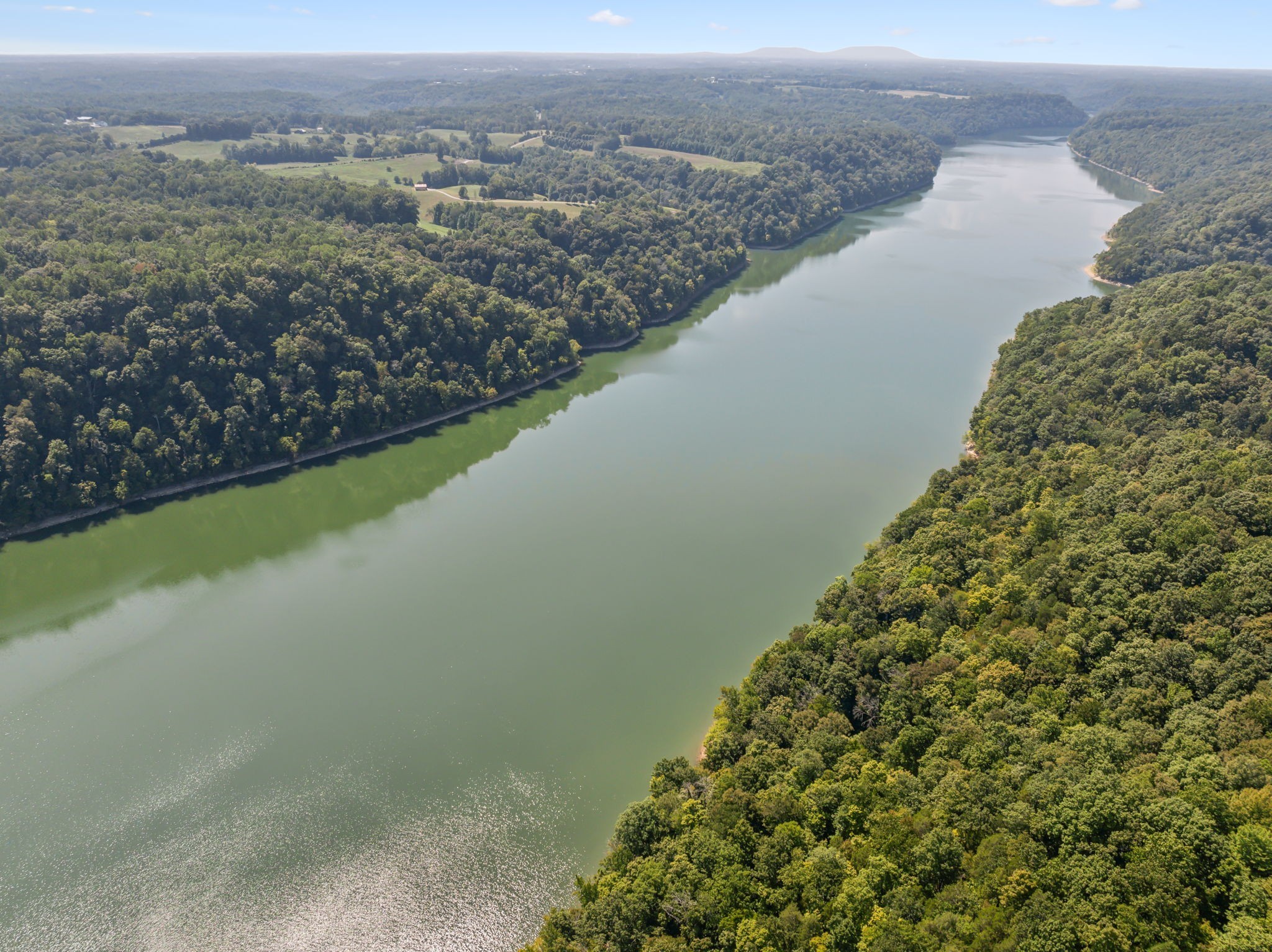 341 Anthony Adcock Road Sparta, TN 38583 - Photo 16 of 37 a view of a lake with a city