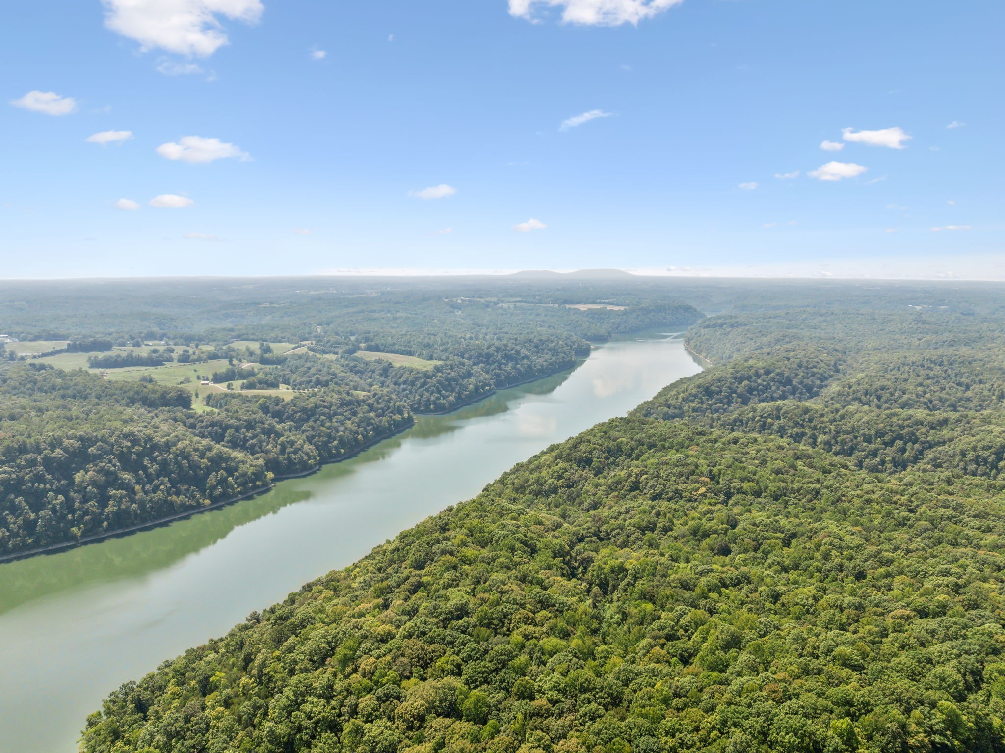 341 Anthony Adcock Road Sparta, TN 38583 - Photo 17 of 37 a view of a lake with a city