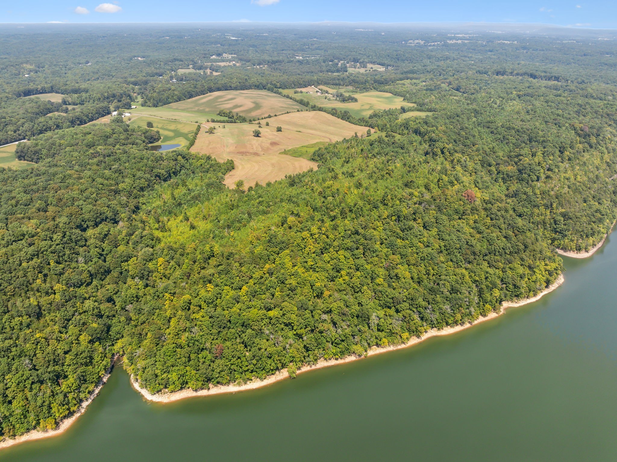 341 Anthony Adcock Road Sparta, TN 38583 - Photo 18 of 37 view of a lake with a mountain