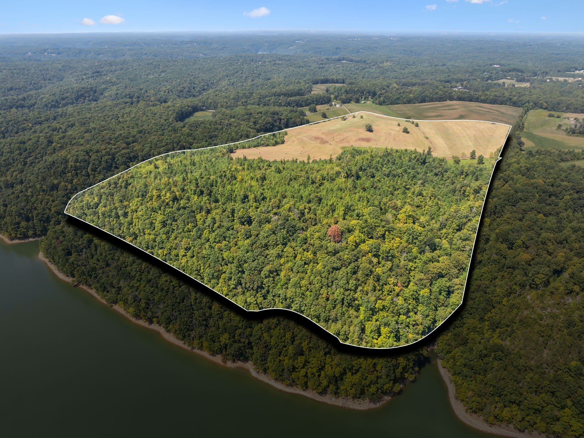 341 Anthony Adcock Road Sparta, TN 38583 - Photo 2 of 37 a view of a lake from a balcony