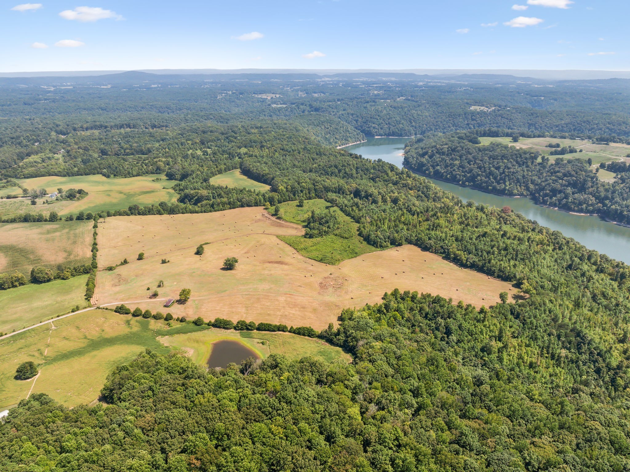 341 Anthony Adcock Road Sparta, TN 38583 - Photo 30 of 37 an aerial view of residential houses with outdoor space