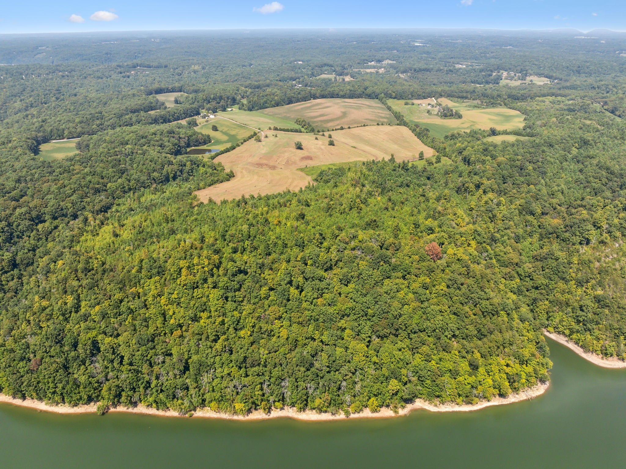 341 Anthony Adcock Road Sparta, TN 38583 - Photo 7 of 37 a view of a lake with a mountain