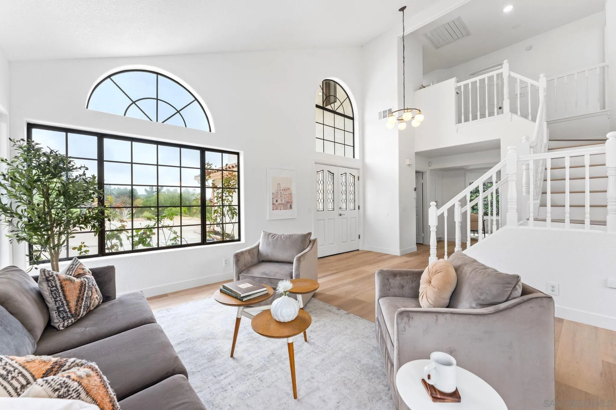 1402 Broken Arrow Lane Fallbrook, CA 92028 - Photo 2 of 34 a living room with furniture and a large window