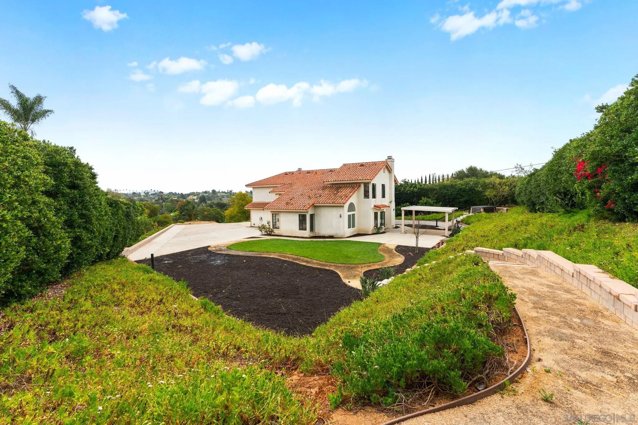 1402 Broken Arrow Lane Fallbrook, CA 92028 - Photo 30 of 34 a view of a house with a big yard