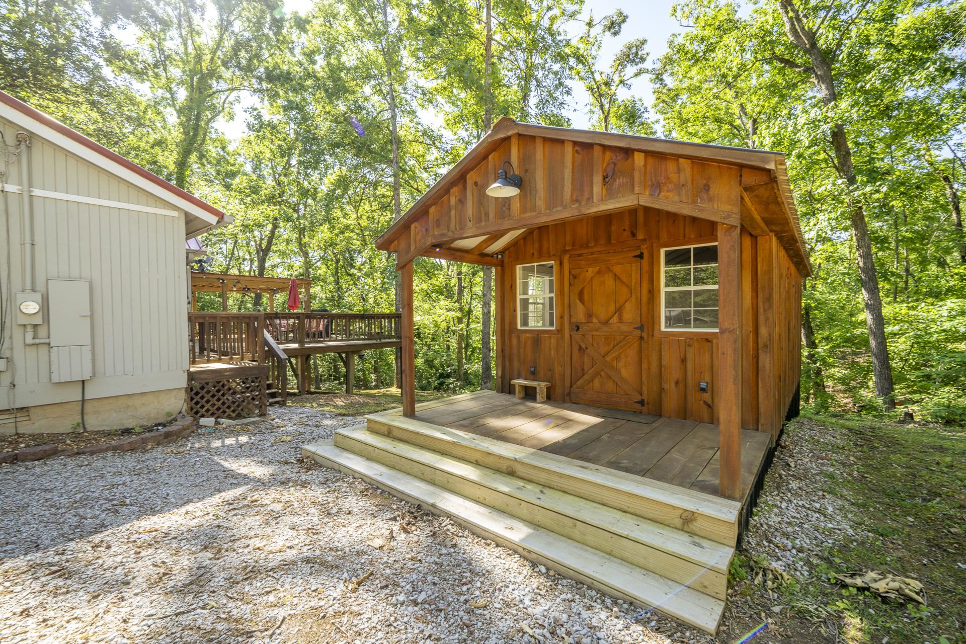 80 Contreau Road Counce, TN 38326 - Photo 26 of 28 a front view of a house with garden