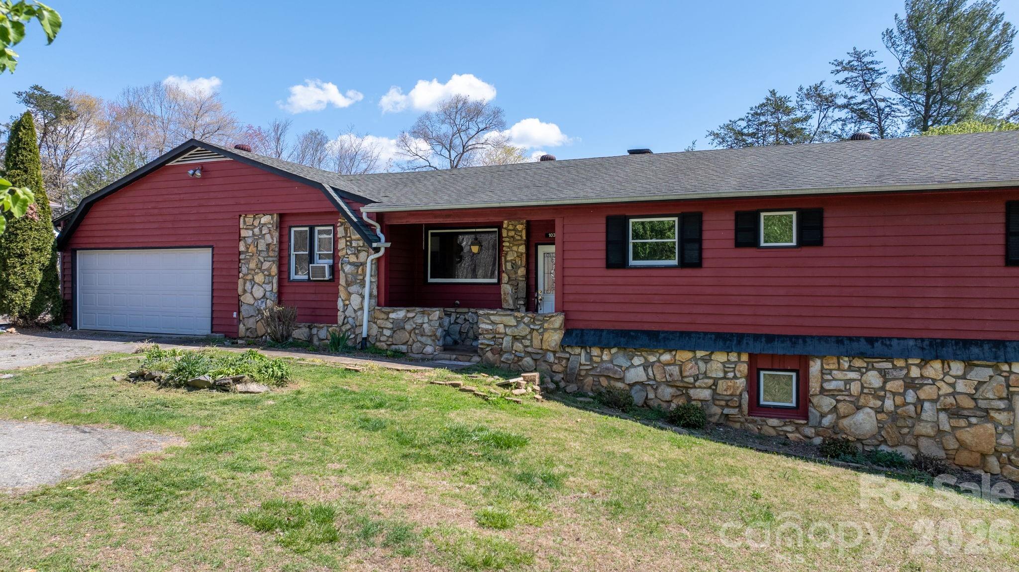 103 Bernice Street Marion, NC 28752 - Photo 1 of 48 a front view of a house with a yard