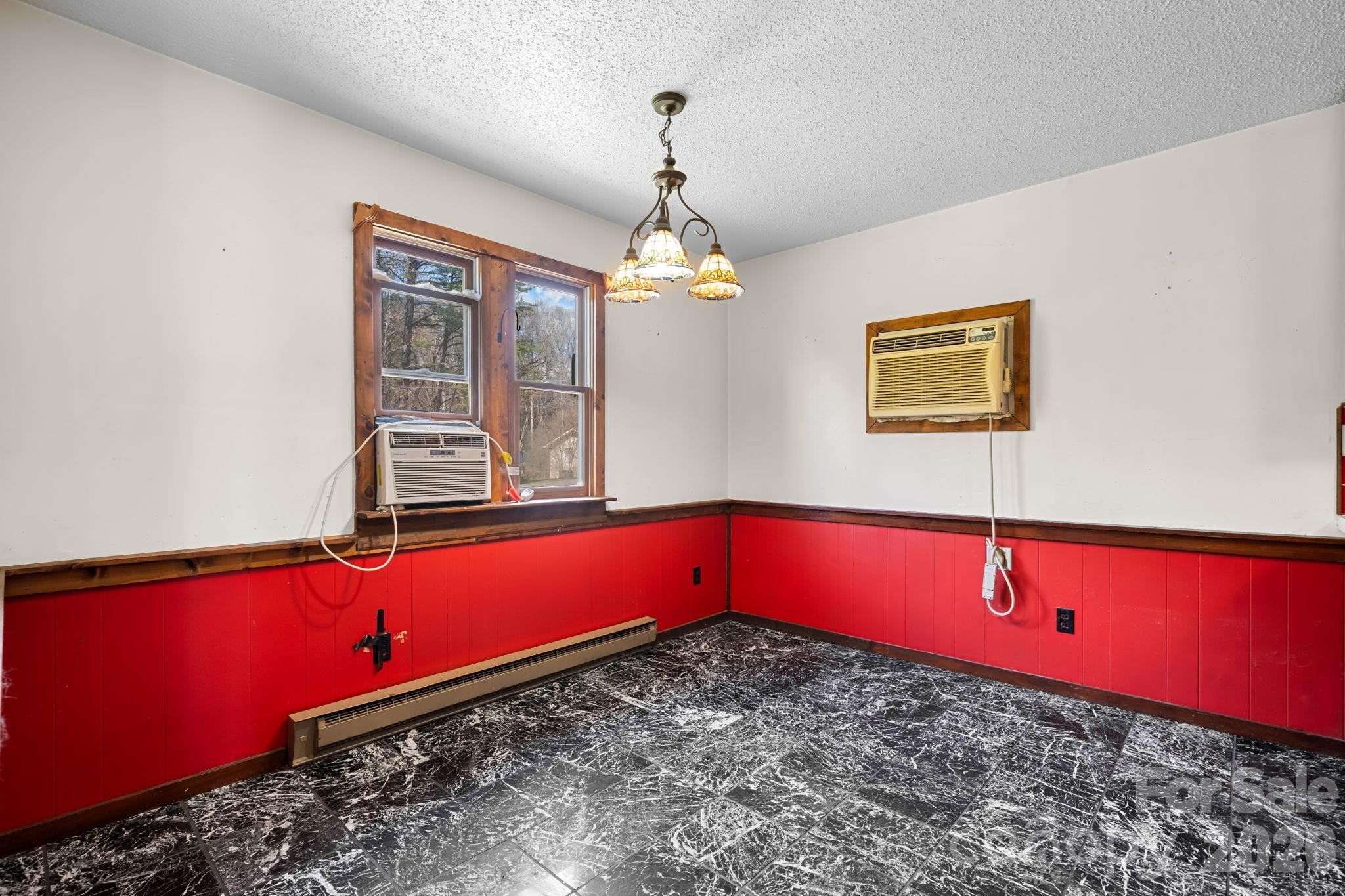 103 Bernice Street Marion, NC 28752 - Photo 16 of 48 a room with pool table and windows