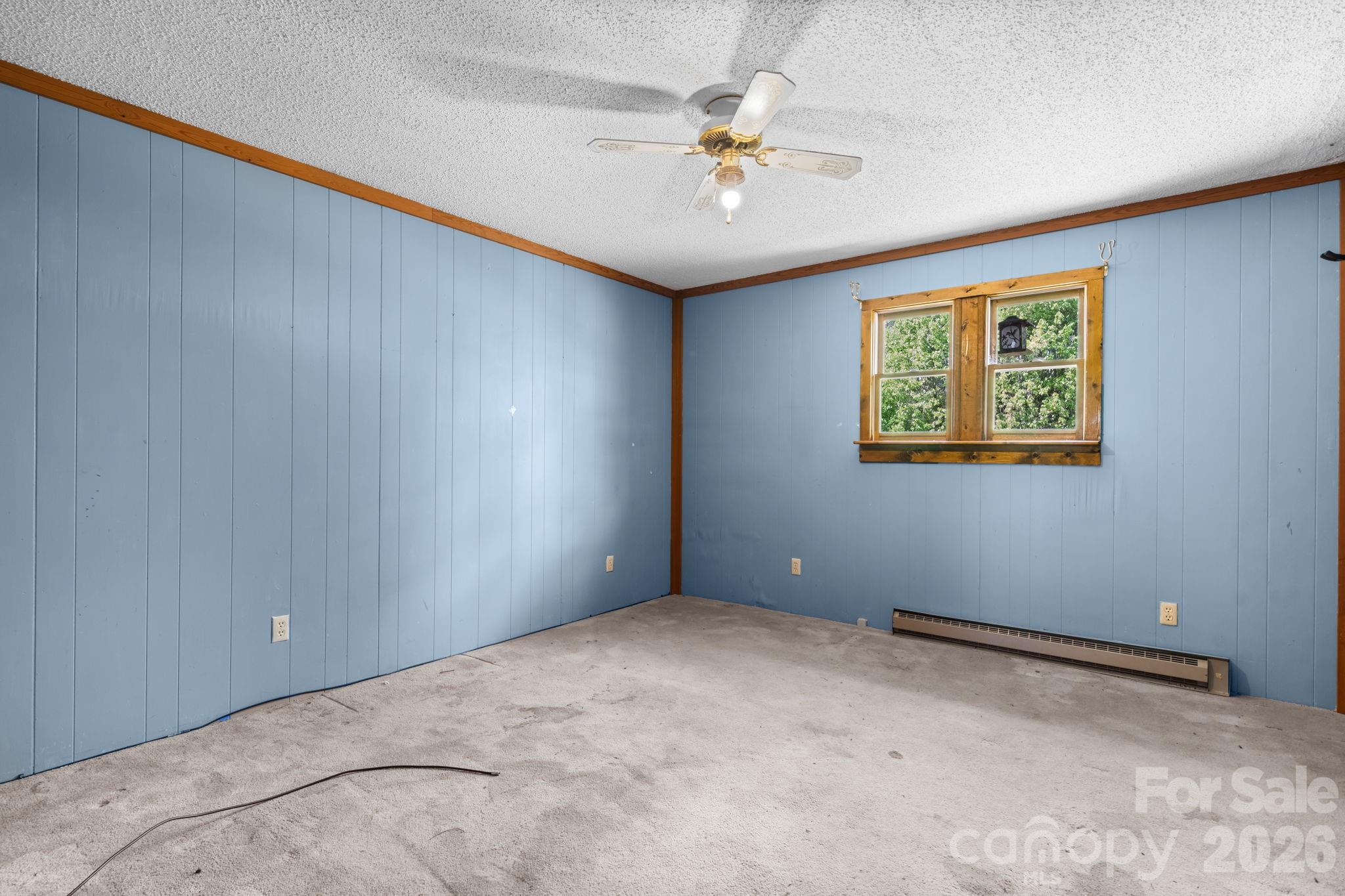 103 Bernice Street Marion, NC 28752 - Photo 18 of 48 a view of an empty room with a window
