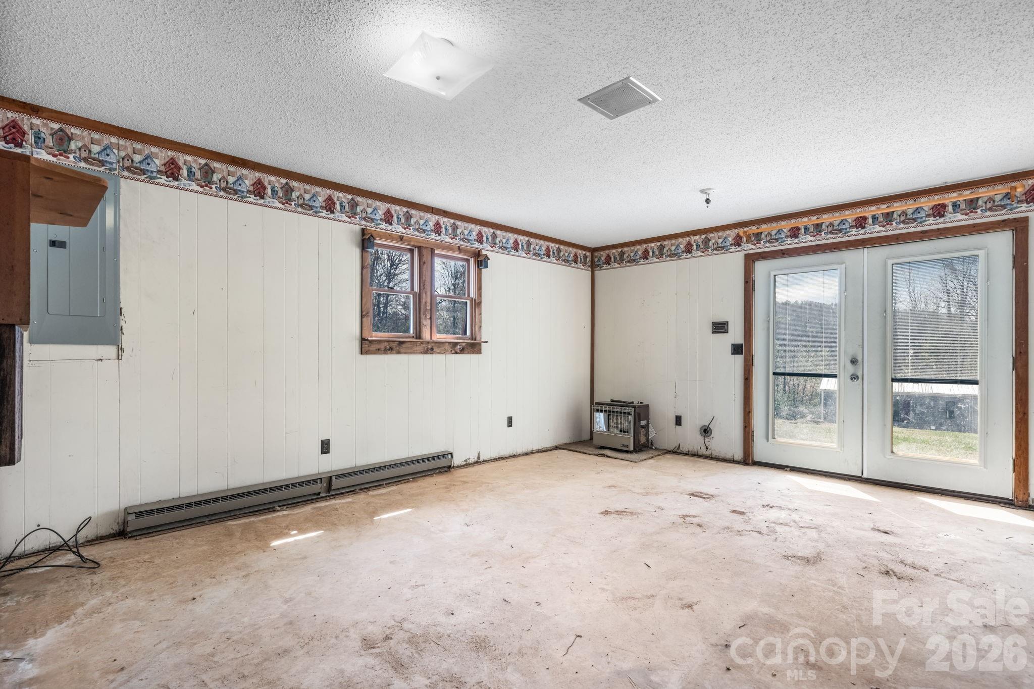 103 Bernice Street Marion, NC 28752 - Photo 28 of 48 a view of an empty room with a window