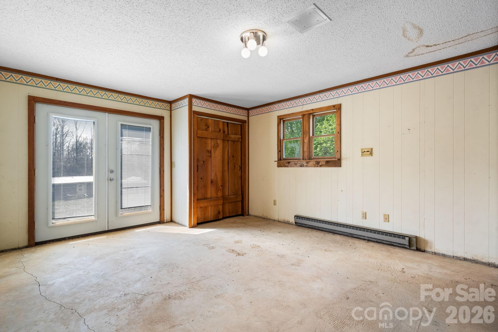 103 Bernice Street Marion, NC 28752 - Photo 34 of 48 an empty room with windows