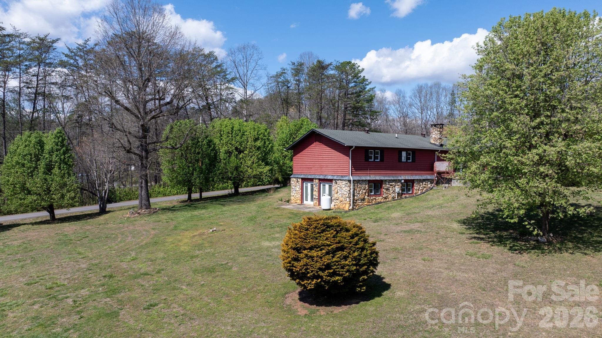 103 Bernice Street Marion, NC 28752 - Photo 41 of 48 front view of a house with a yard