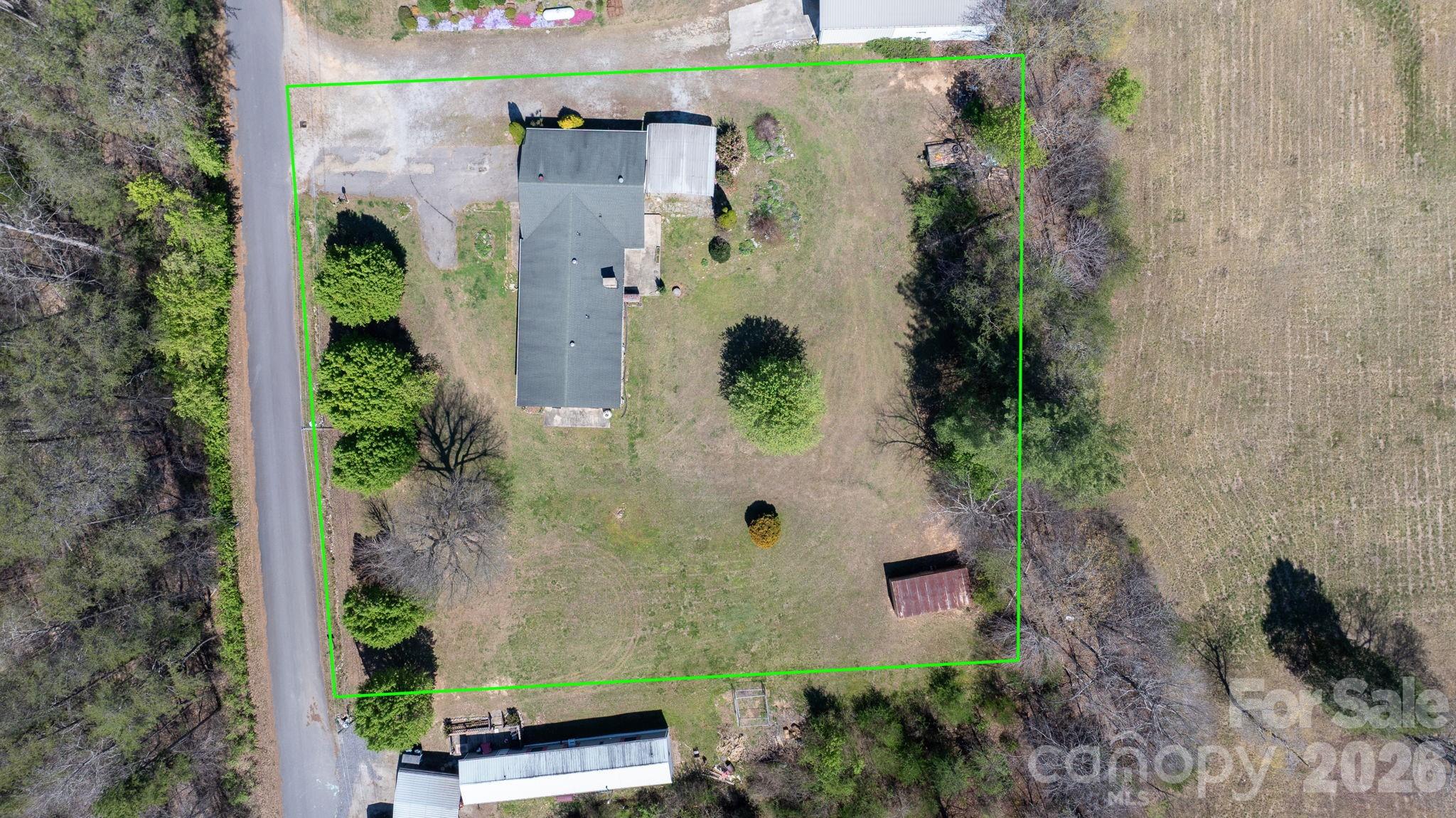 103 Bernice Street Marion, NC 28752 - Photo 44 of 48 an aerial view of a house with a yard