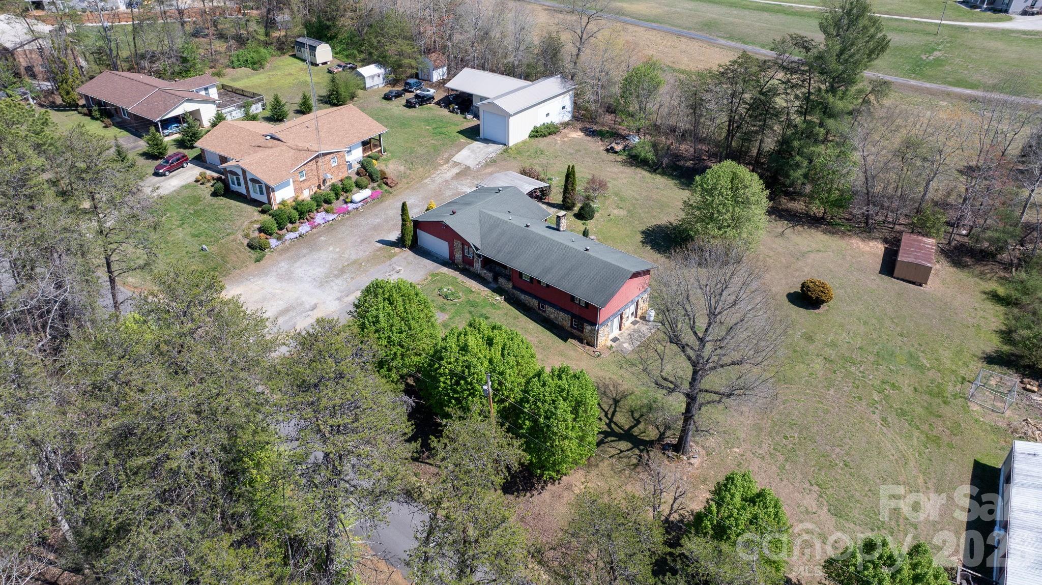 103 Bernice Street Marion, NC 28752 - Photo 46 of 48 an aerial view of a house with a yard