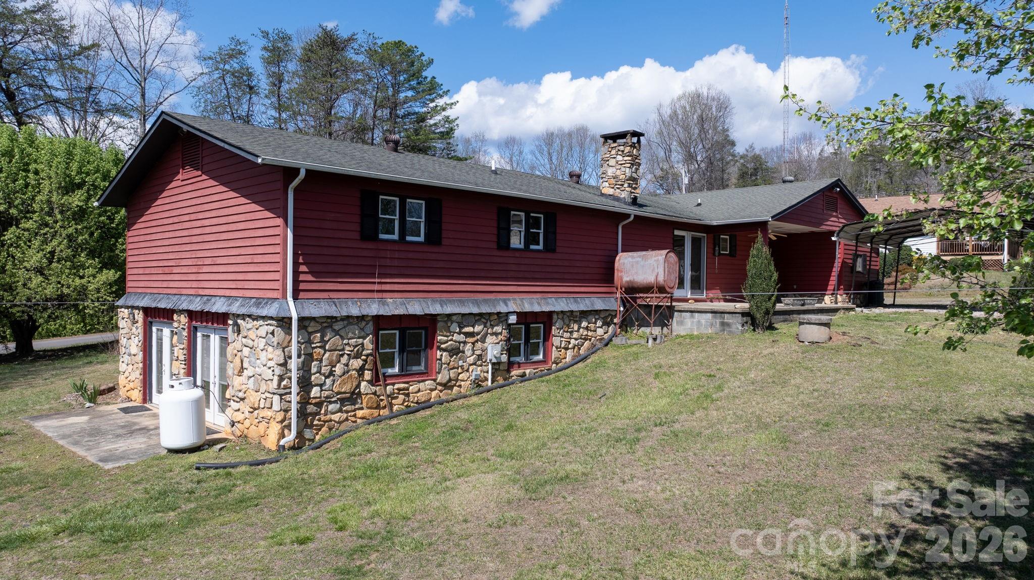 103 Bernice Street Marion, NC 28752 - Photo 7 of 48 a view of a house with wooden fence