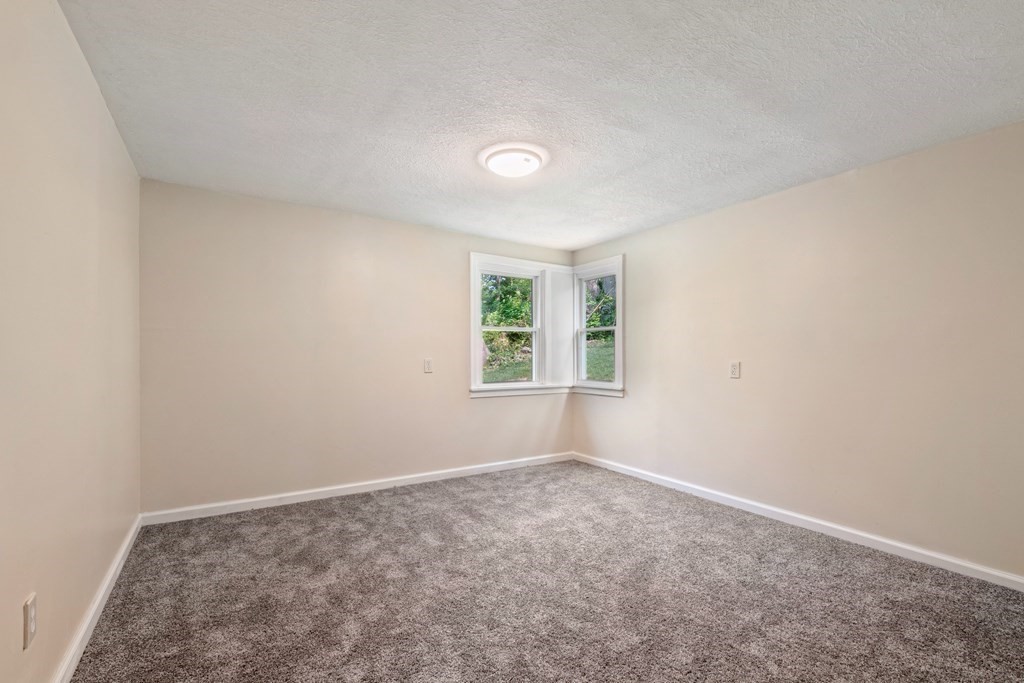 46 New State Road Montgomery, MA 01085 - Photo 14 of 20 an empty room with windows