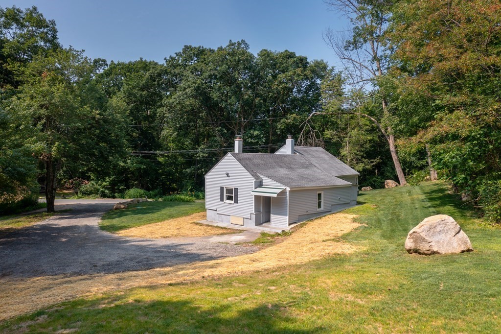 46 New State Road Montgomery, MA 01085 - Photo 17 of 20 a view of a house with swimming pool and yard