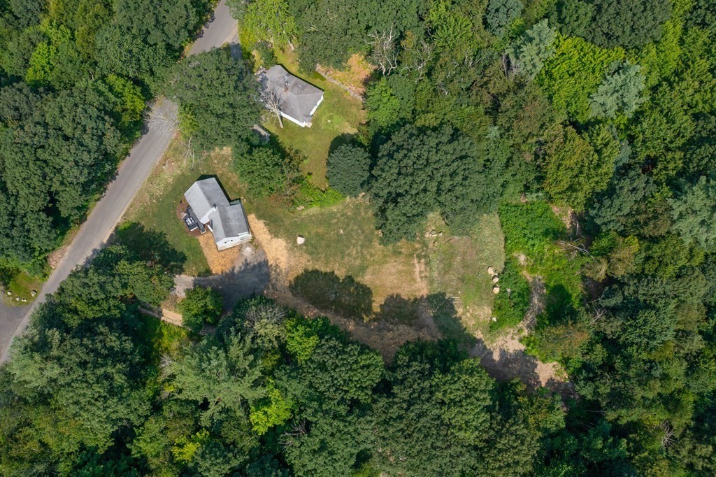 46 New State Road Montgomery, MA 01085 - Photo 18 of 20 an aerial view of residential house with outdoor space and trees all around