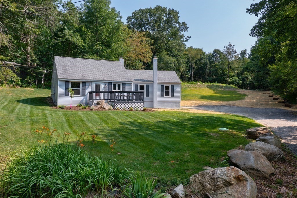46 New State Road Montgomery, MA 01085 - Photo 3 of 20 a view of a house with pool and a yard