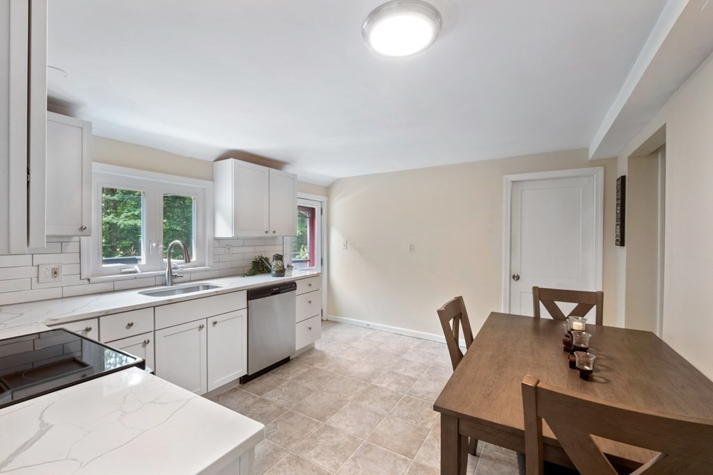 46 New State Road Montgomery, MA 01085 - Photo 8 of 20 a kitchen with a sink cabinets and window