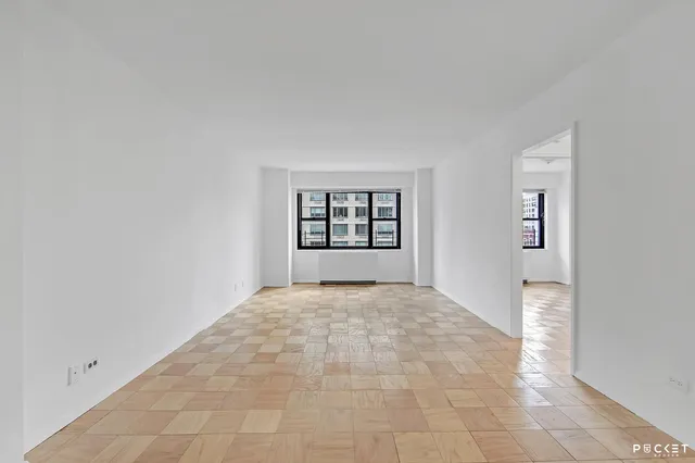 an empty room with windows