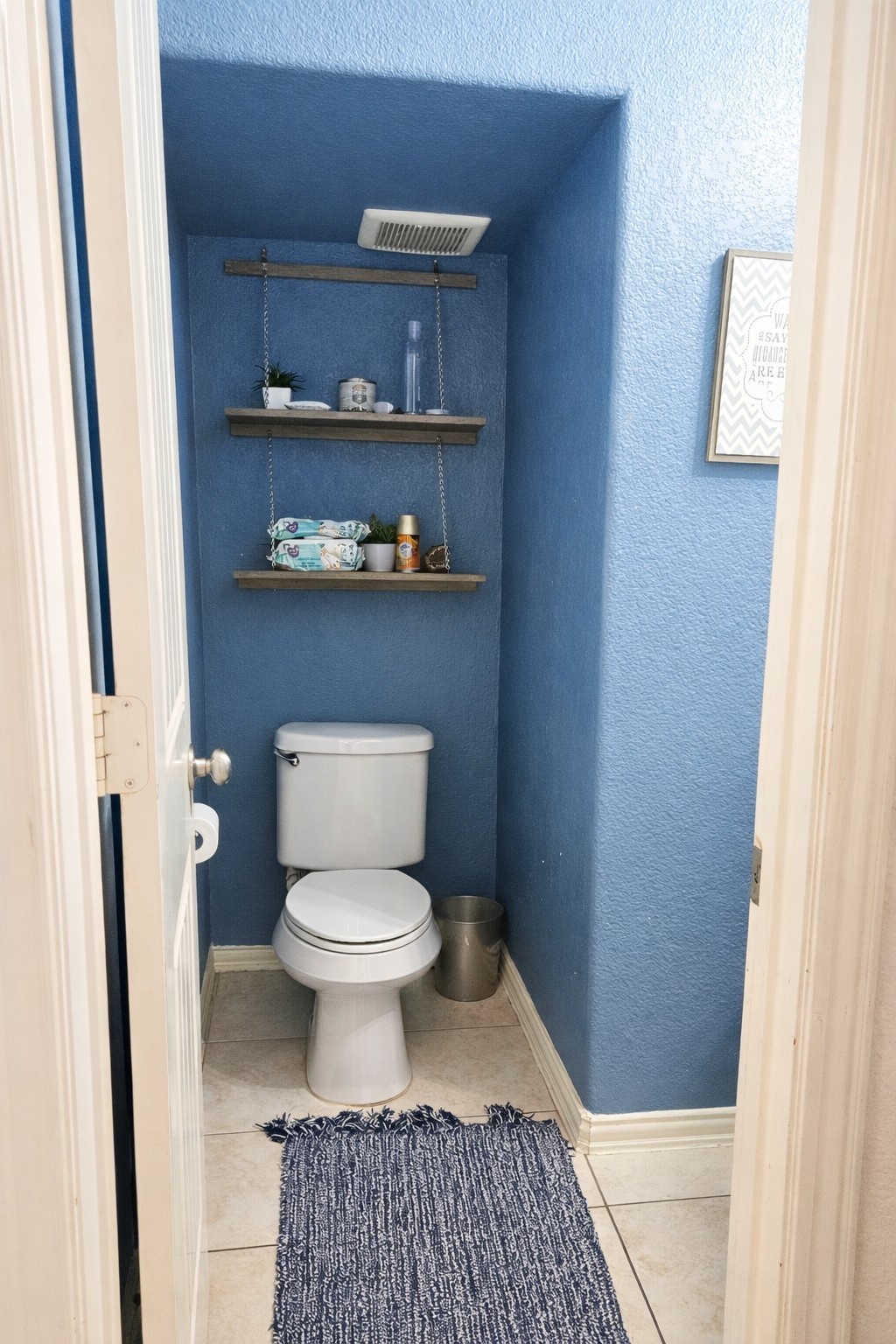 16410 Regal Exeter Drive Houston, TX 77073 - Photo 11 of 21 a bathroom with a toilet and a cabinets
