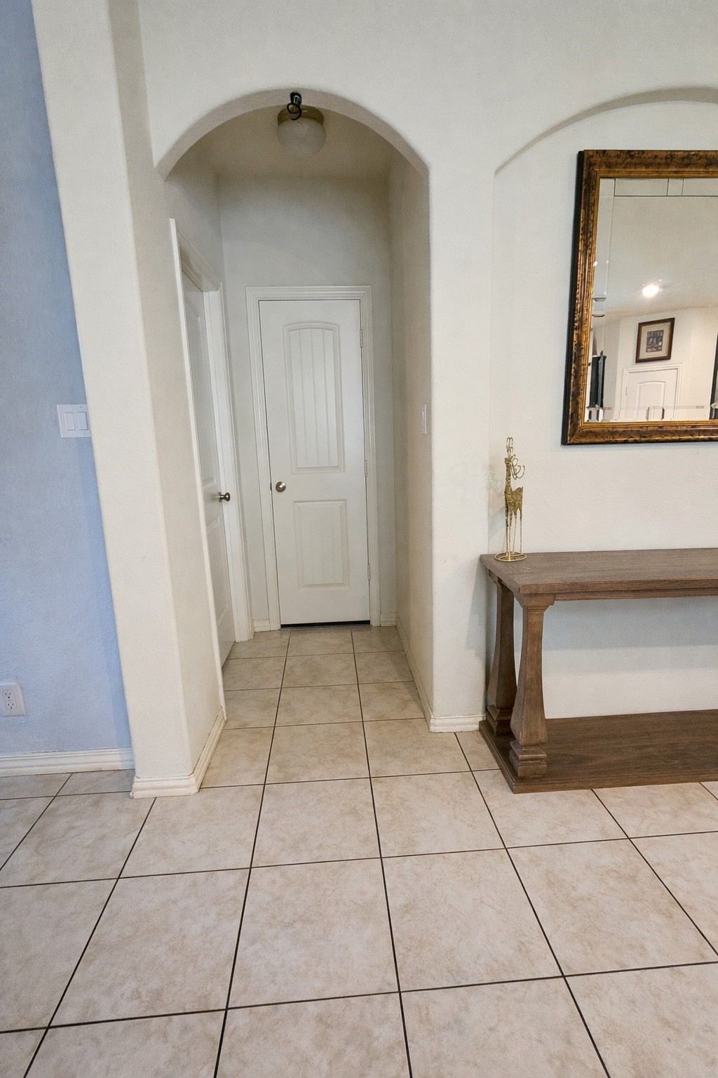 16410 Regal Exeter Drive Houston, TX 77073 - Photo 8 of 21 a view of a hallway to rooms and stairs
