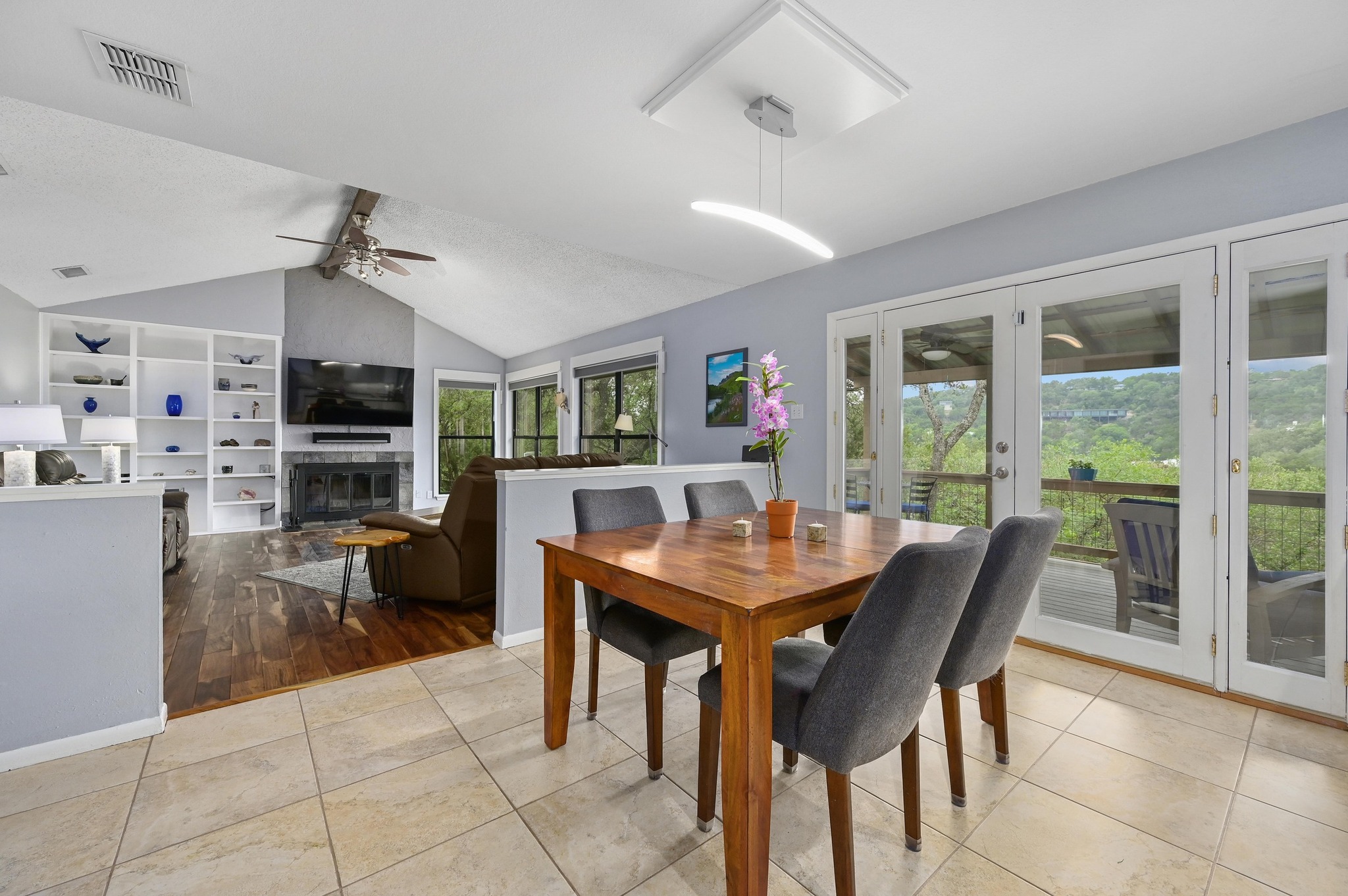 2009 South Oak Canyon Road Austin, TX 78746 - Photo 11 of 37 a view of a dining room with furniture window and outside view