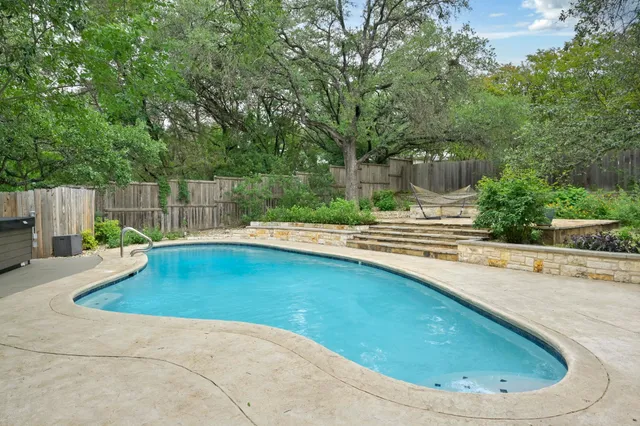 a swimming pool with outdoor space