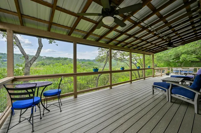 a view of sitting area with furniture and wooden floor