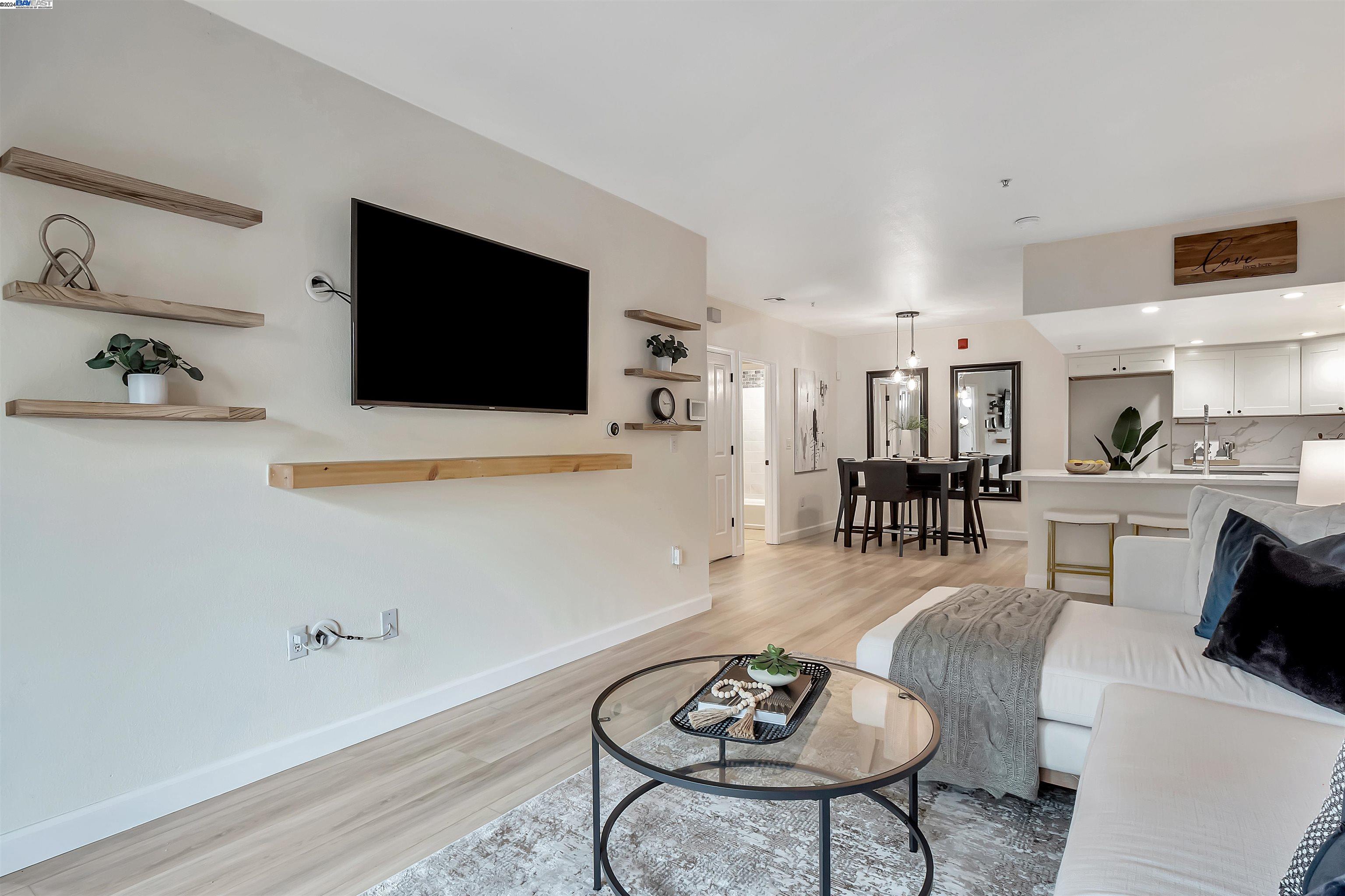 Undisclosed Address San Ramon, CA 94583 - Photo 12 of 40 a living room with furniture and a flat screen tv
