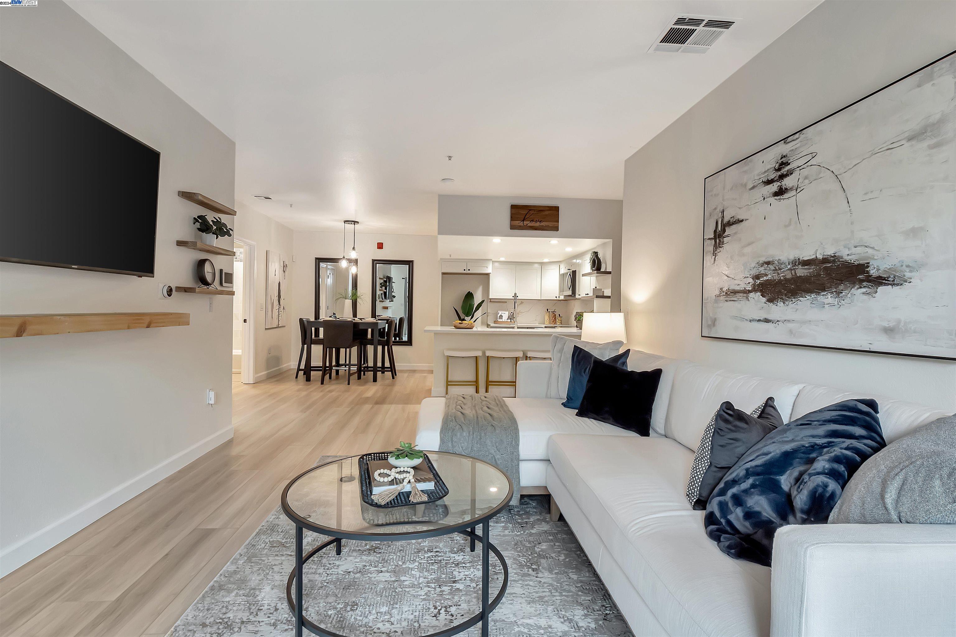 Undisclosed Address San Ramon, CA 94583 - Photo 13 of 40 a living room with furniture and a flat screen tv