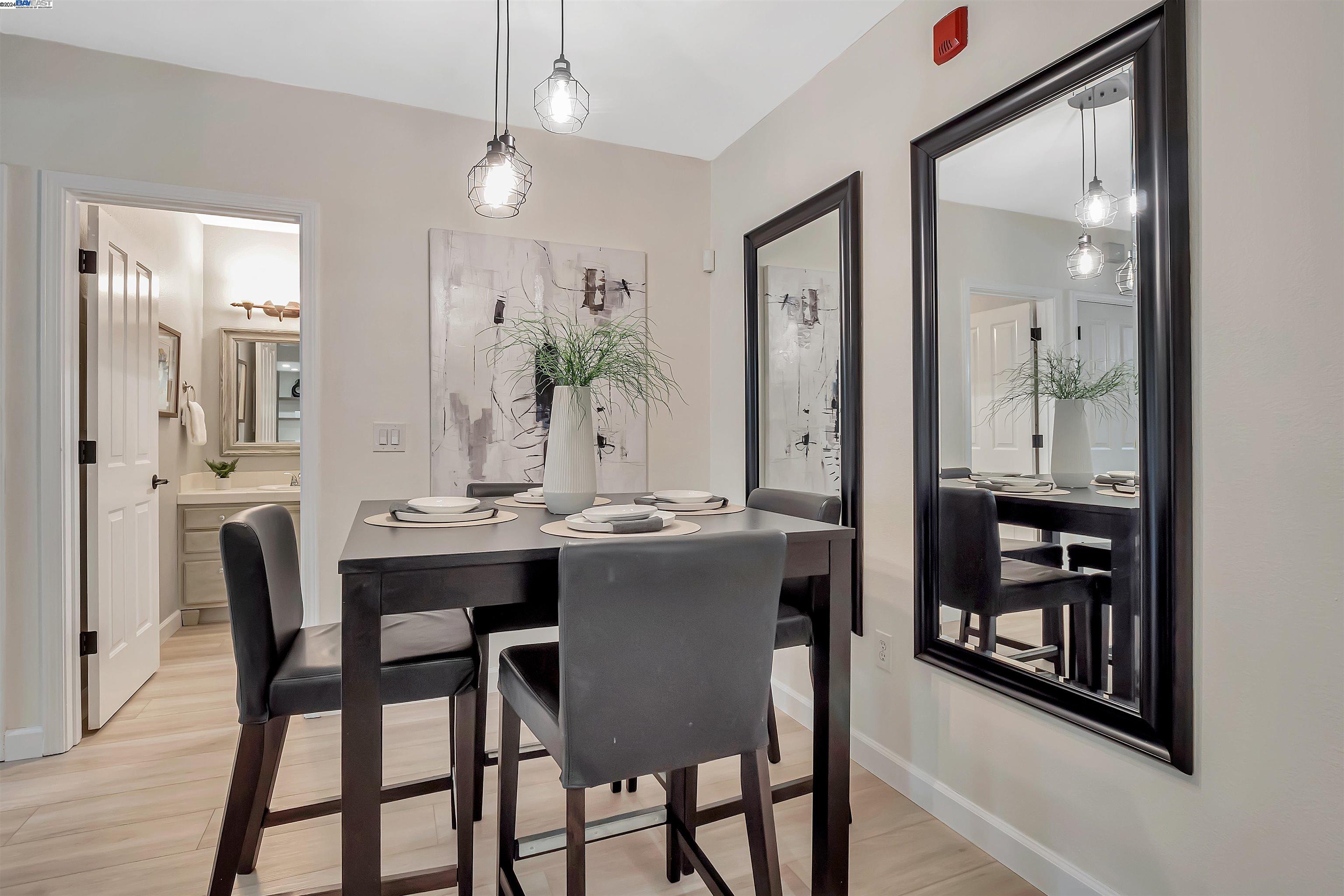 Undisclosed Address San Ramon, CA 94583 - Photo 18 of 40 a view of a dining room with furniture and wooden floor