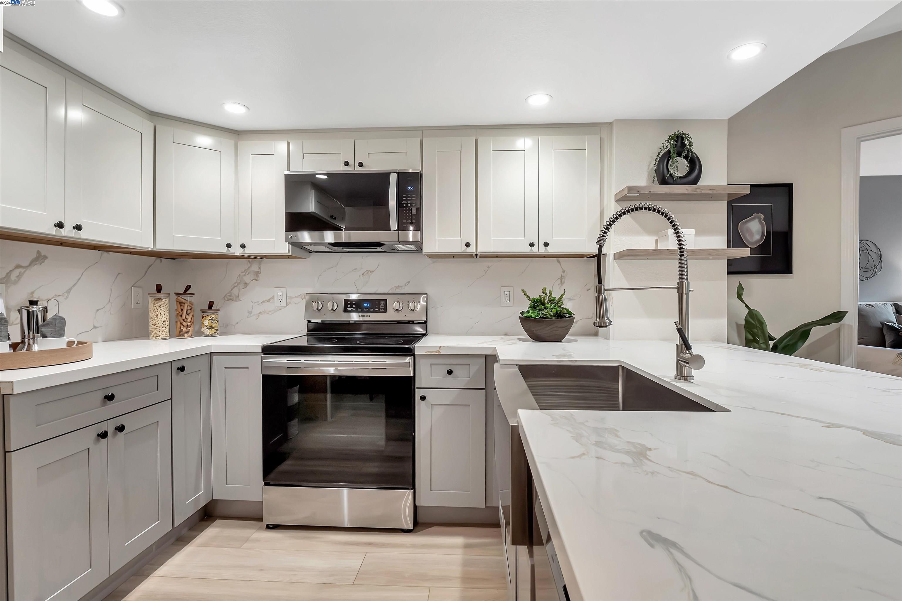 Undisclosed Address San Ramon, CA 94583 - Photo 20 of 40 a kitchen with white cabinets stainless steel appliances and sink